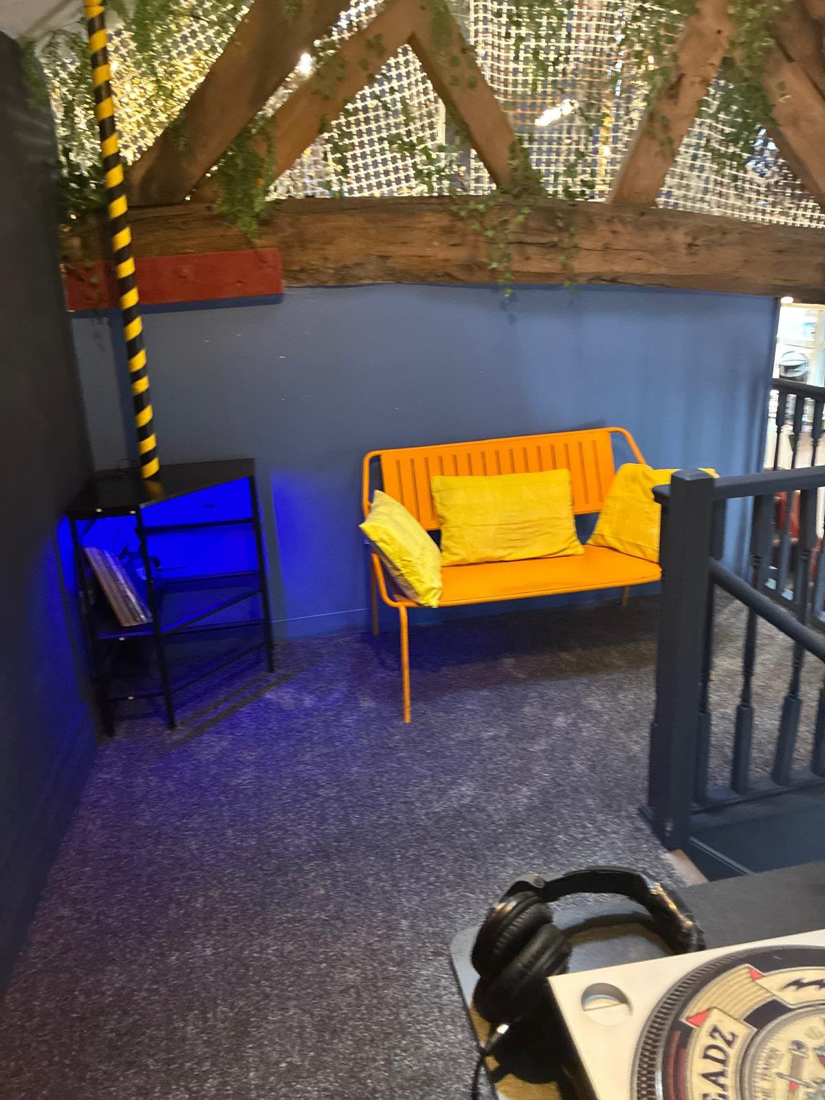 Relaxed seating area in the Unknown Macc DJ practice room